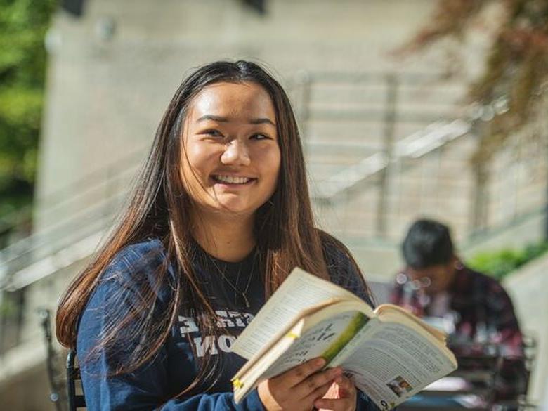 A student reads a book